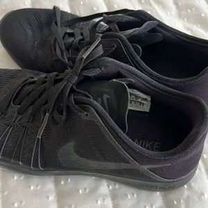 Black size 7.5 women’s Nikes. Light use.